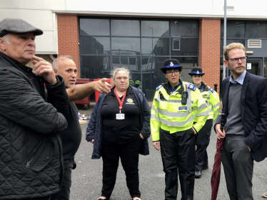 Jack Brereton with police officers and council